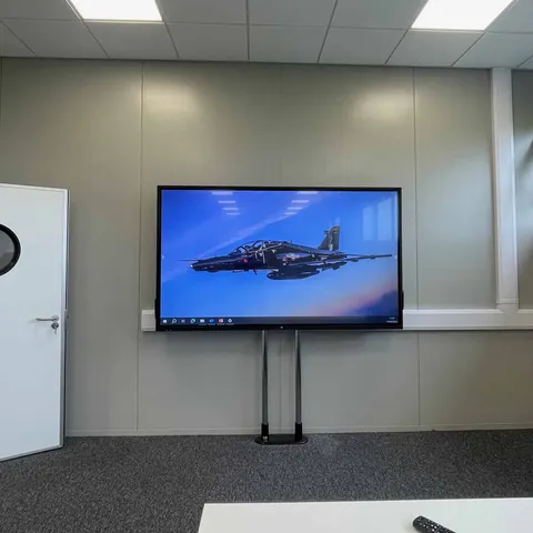 Interactive display on a mobile floor stand in a training room