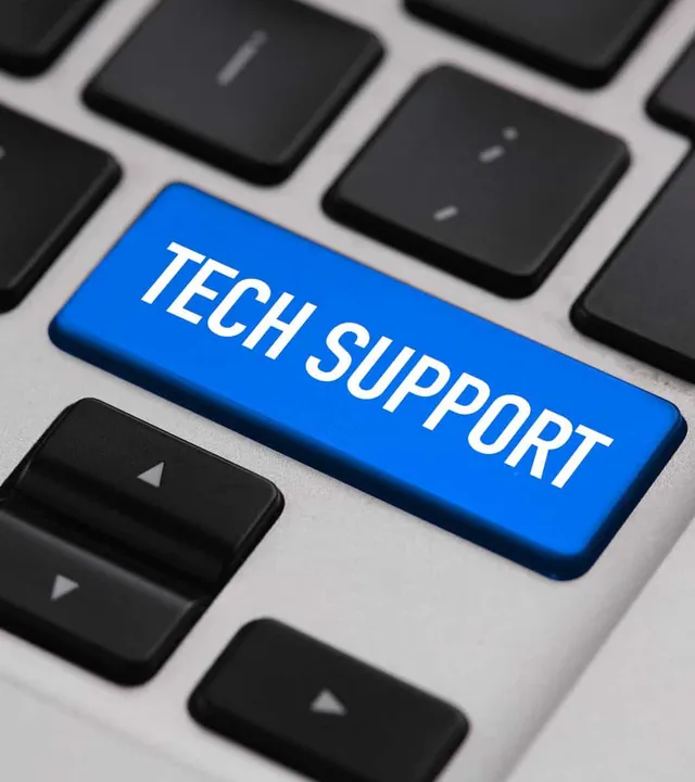 Close-up of a keyboard with a blue Tech Support key